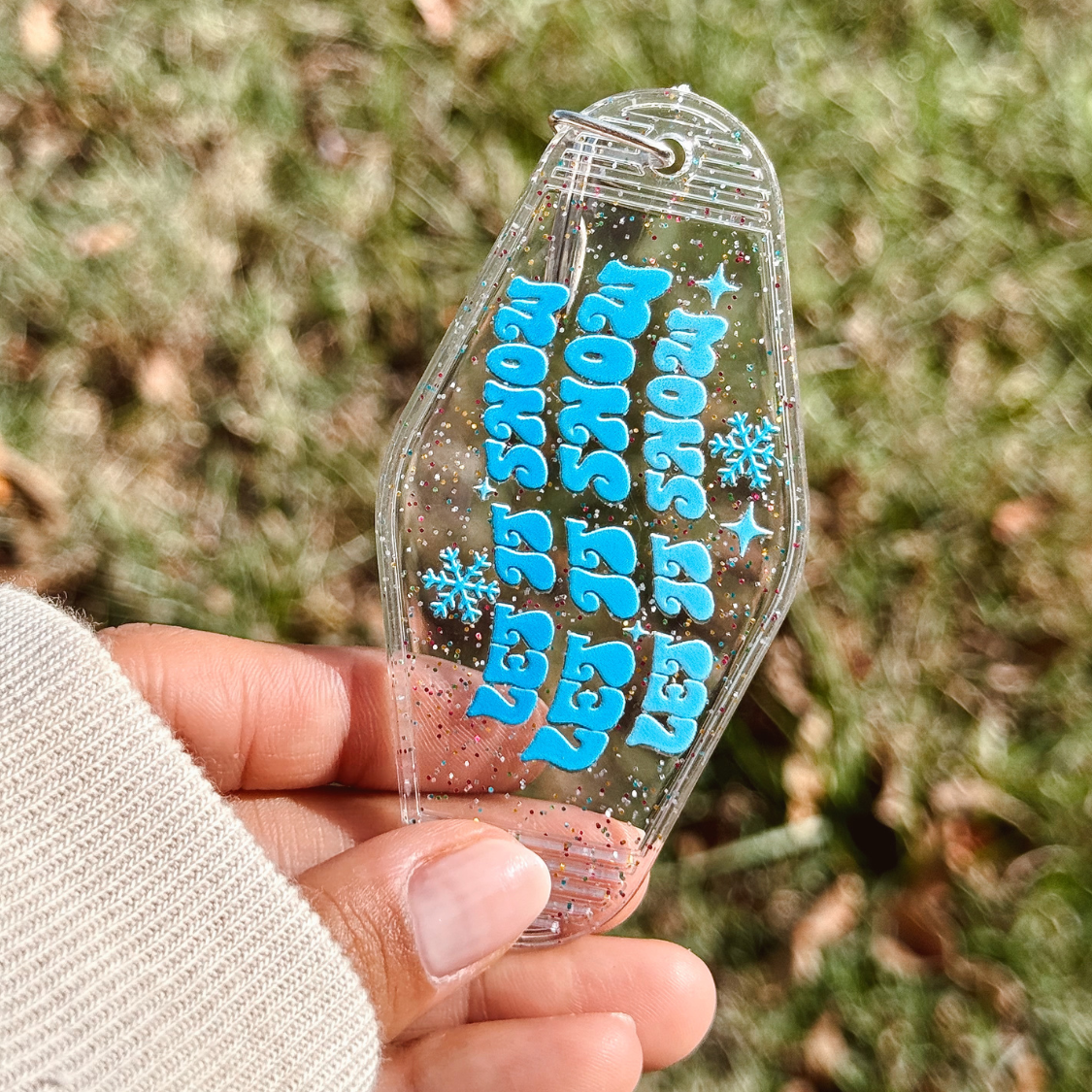 Let is Snow Motel Keychain